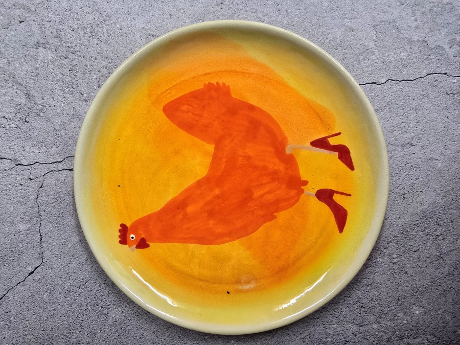 Apelsininė višta raudonais batukais Apelsininė višta raudonais batukais