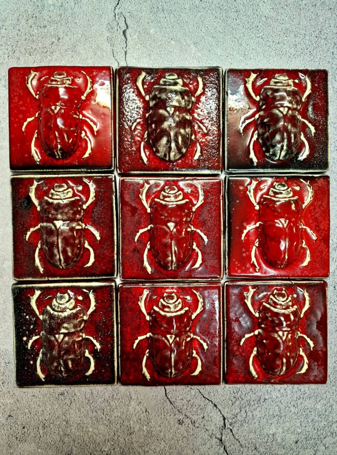 RED scarab tile