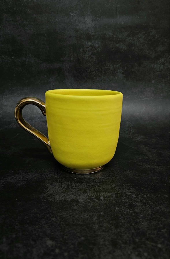 Geltonas puodelis 26